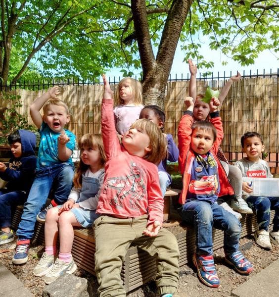 Children spending time together in the nursery garden
